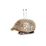 A silver pin cushion, in the form of a hedgehog, Birmingham 1903;