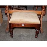 A 19th Century mahogany stool, with upholstered drop in seat raised on turned supports, 52cm