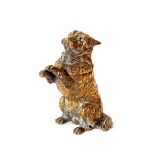 A Victorian cast brass inkwell, in the form of a begging dog, having hinged lid, 14cm high