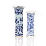 A 19th Century Chinese blue and white porcelain cylindrical vase, decorated figures, prunus and