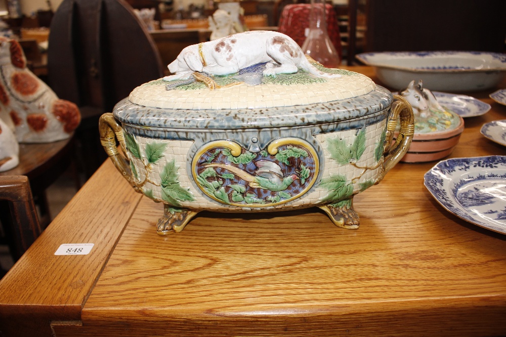 A Minton Majolica game pie dish and cover, decorated gun dog and shooting apparel to the lid, the - Image 19 of 32