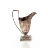 A late Victorian silver cream jug, of baluster panelled form, Birmingham 1892, 12.5cm