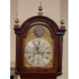 A George III mahogany long case clock, the eight day movement and brass moon face dial by Higdon
