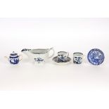 A Lowestoft sauce boat, 20cm long (AF); two 18th Century blue and white coffee cups; a Worcester