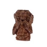 A carved oak corbel, of an angel, 28cm, possibly 16th Century
