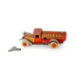 A miniature tin plate Shell tanker, circa. 1925-1930 in good condition with key and in working