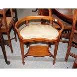 An Edwardian mahogany boxwood strung and chequer banded kidney shaped dressing stool, fitted under