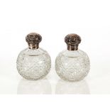 A hobnail cut glass globular scent bottle, having floral embossed silver mount, Hallmarked for