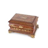 A 19th Century rosewood sewing box, having brass inlaid decoration raised on claw feet, 25cm wide