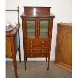 An Edwardian mahogany inlaid and chequered banded display / music cabinet, the display shelf