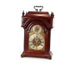 An unusual 18th Century mahogany cased bracket clock, with brass foliate engraved dial, with steel
