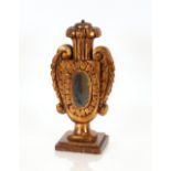 A continental carved gilt wood and mirrored table lamp base, of baluster vase form with acanthus