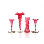 A pair of cranberry glass trumpet shaped spill vases, with plated stands, 18cm; a large cranberry
