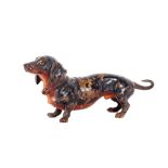 A cold painted bronze study of a Dachshund, 10cm long