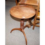 A 19th Century mahogany circular occasional table, the dish top raised on a turned baluster column