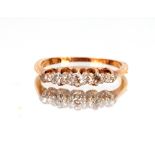 A small 9ct gold six stone diamond set ring