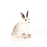 A Winstanley pottery model of a seated hare, 27cm high overall