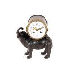 A 19th Century brass and bronze mantel clock, in the form of an elephant, the drum shaped eight