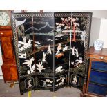 A decorative Japanese lacquer and hardstone four fold screen