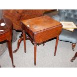 A 19th Century mahogany drop leaf writing table, having lifting top, the interior with pen tray