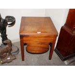 A 19th Century mahogany box commode, raised on square section supports, 46cm wide, 48cm deep, 50cm