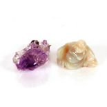 A vintage Chinese amethyst carving, of a fruit with trailing leaves attached with a later white