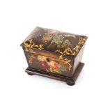 A Victorian papier maché two compartment tea caddy, 17cm wide, 12cm high