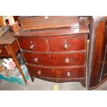 A 19th Century mahogany bow front chest of two short and two long drawers, of small proportions,