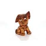 An Art Deco carved wooden dog clock, 16cm high