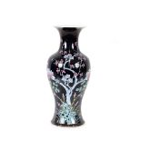A 19th Century Chinese Famille Noir baluster vase, profusely decorated prunus, 45.5cm high