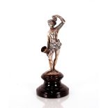 An antique English Hallmarked silver figure of Bacchus, on a turned wooden socle, 13.5cm high