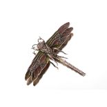 A white metal marcasite and enamel decorated dragonfly brooch, 6.5cm x 8.5cm