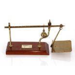 A set of W.T.Avery Ltd. brass and mahogany inlaid postal scales, with faux ivory charge scale,