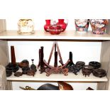 A quantity of various oriental carved hardwood vase and plate stands