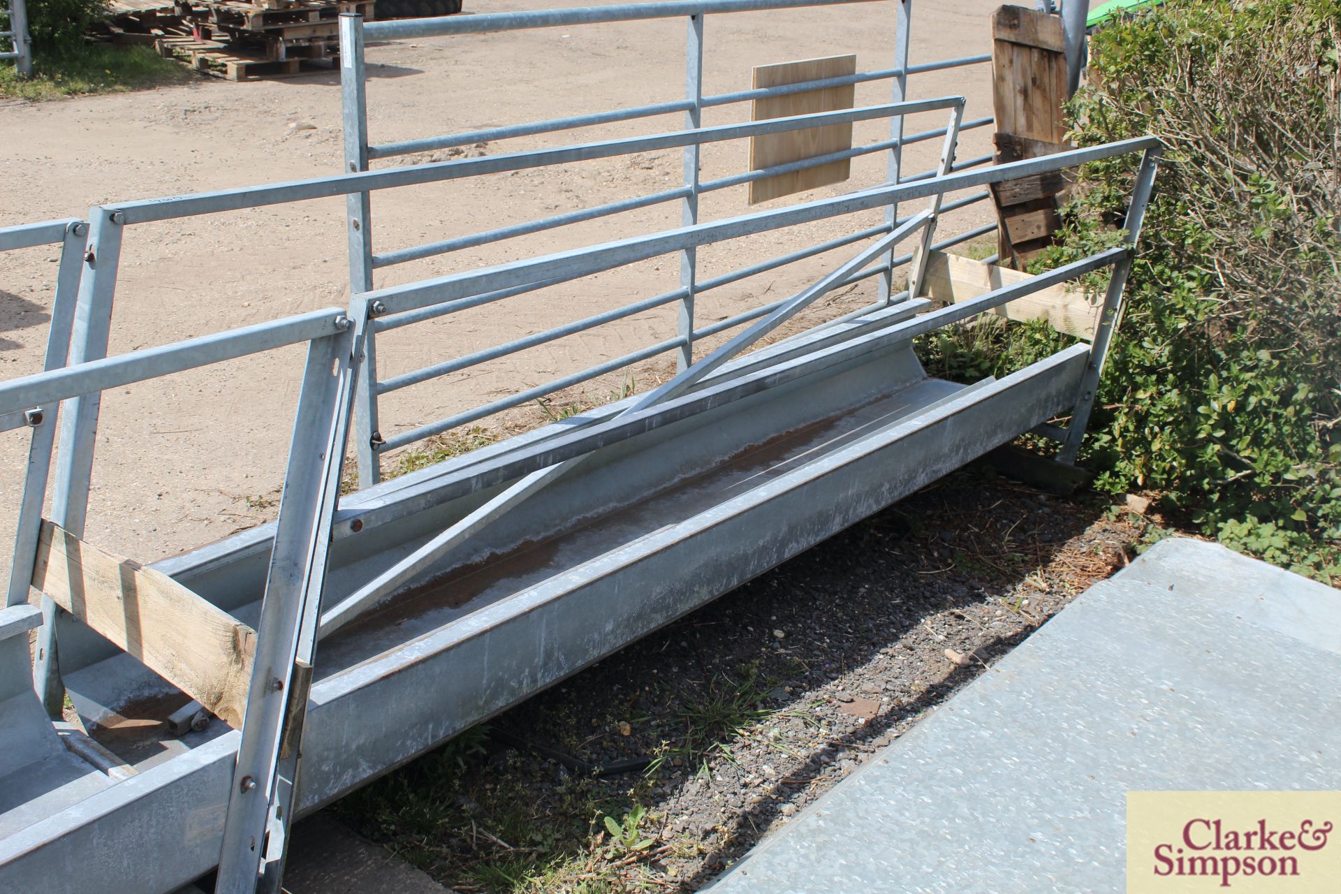 Walk through galvanised trough. *