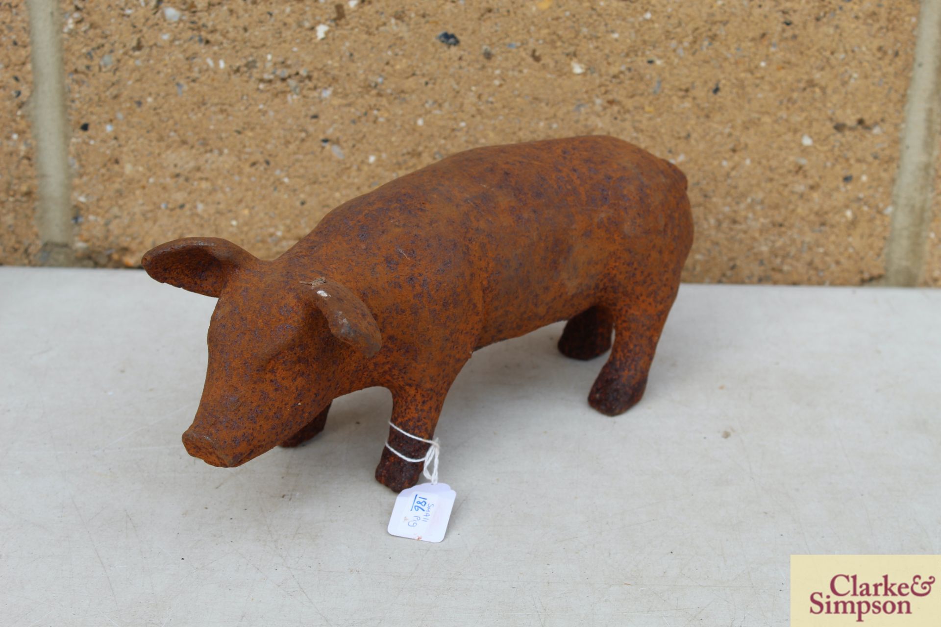 Small cast iron pig. *