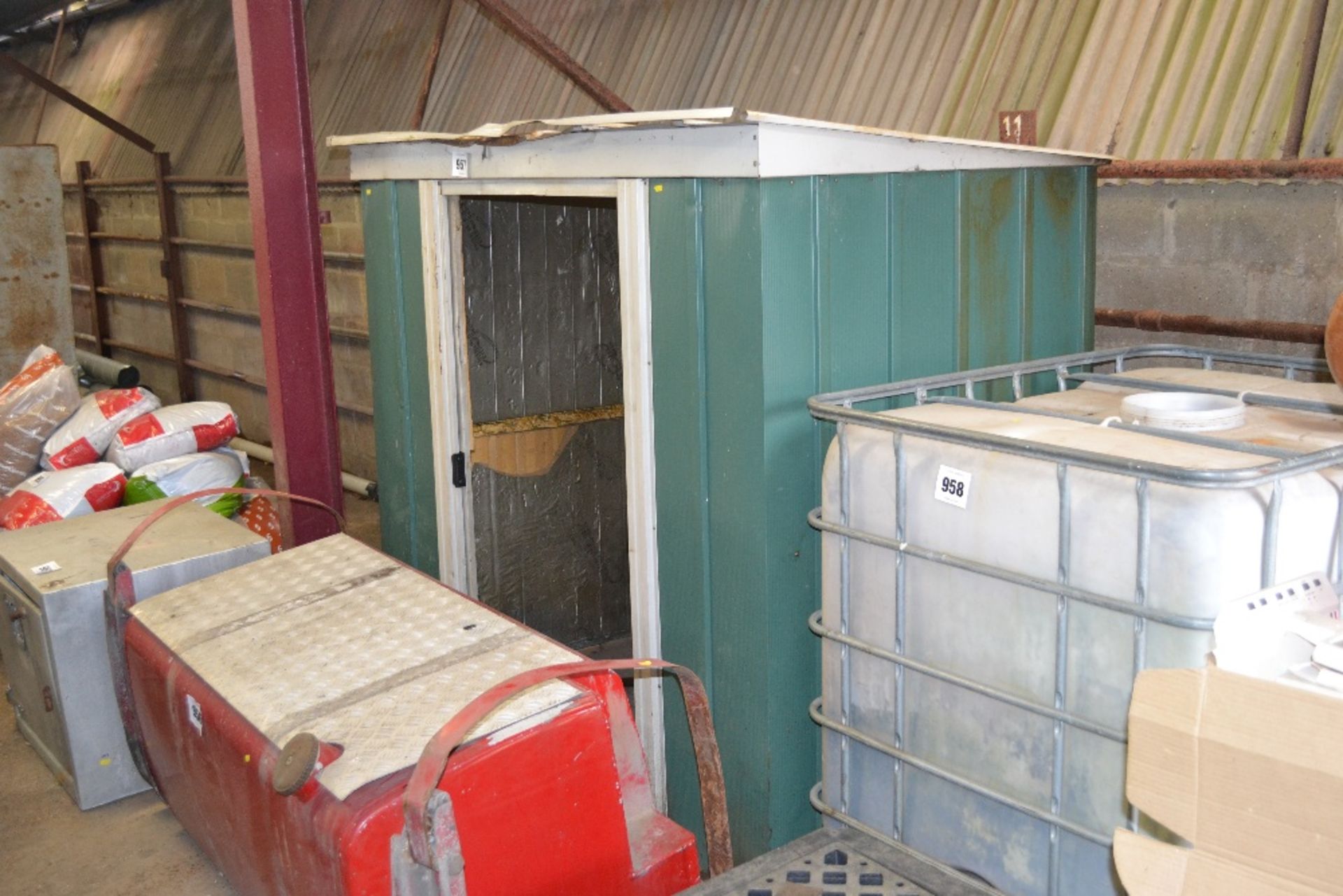 6ft x 4ft tin garden shed with sliding doors.