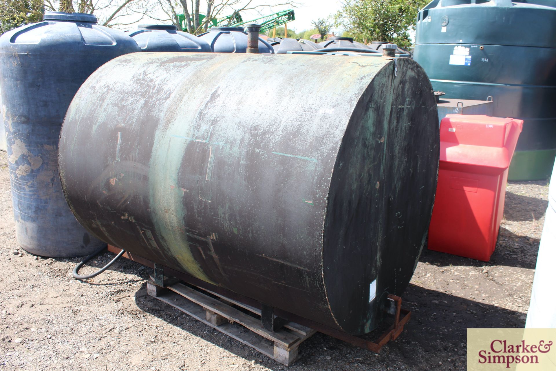 c.2,000L metal cylindrical diesel tank. *