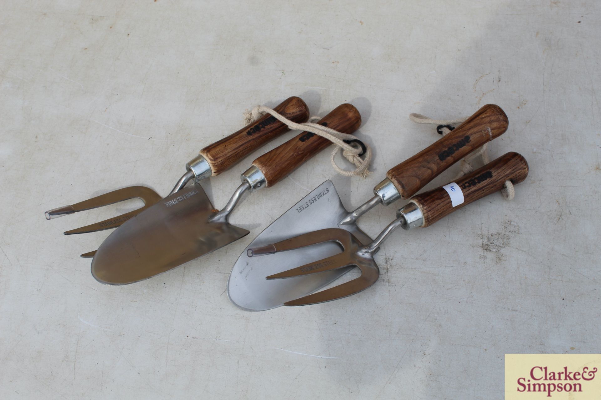 2x stainless steel hand trowel and fork. *