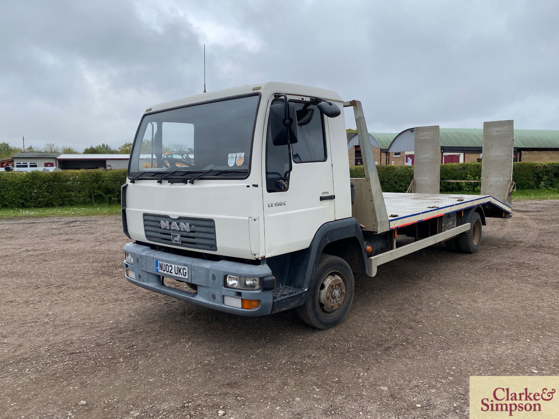 MAN LE150C 7.5T 4x2 beavertail lorry. Registration NU02 UKG. Date of first registration 15/05/