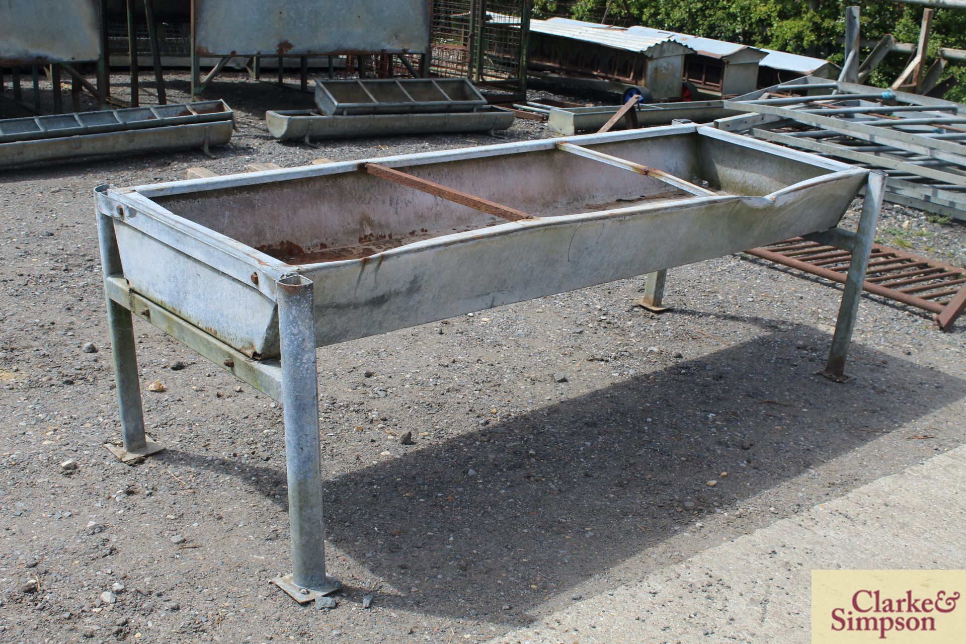 Cattle trough on stand. *