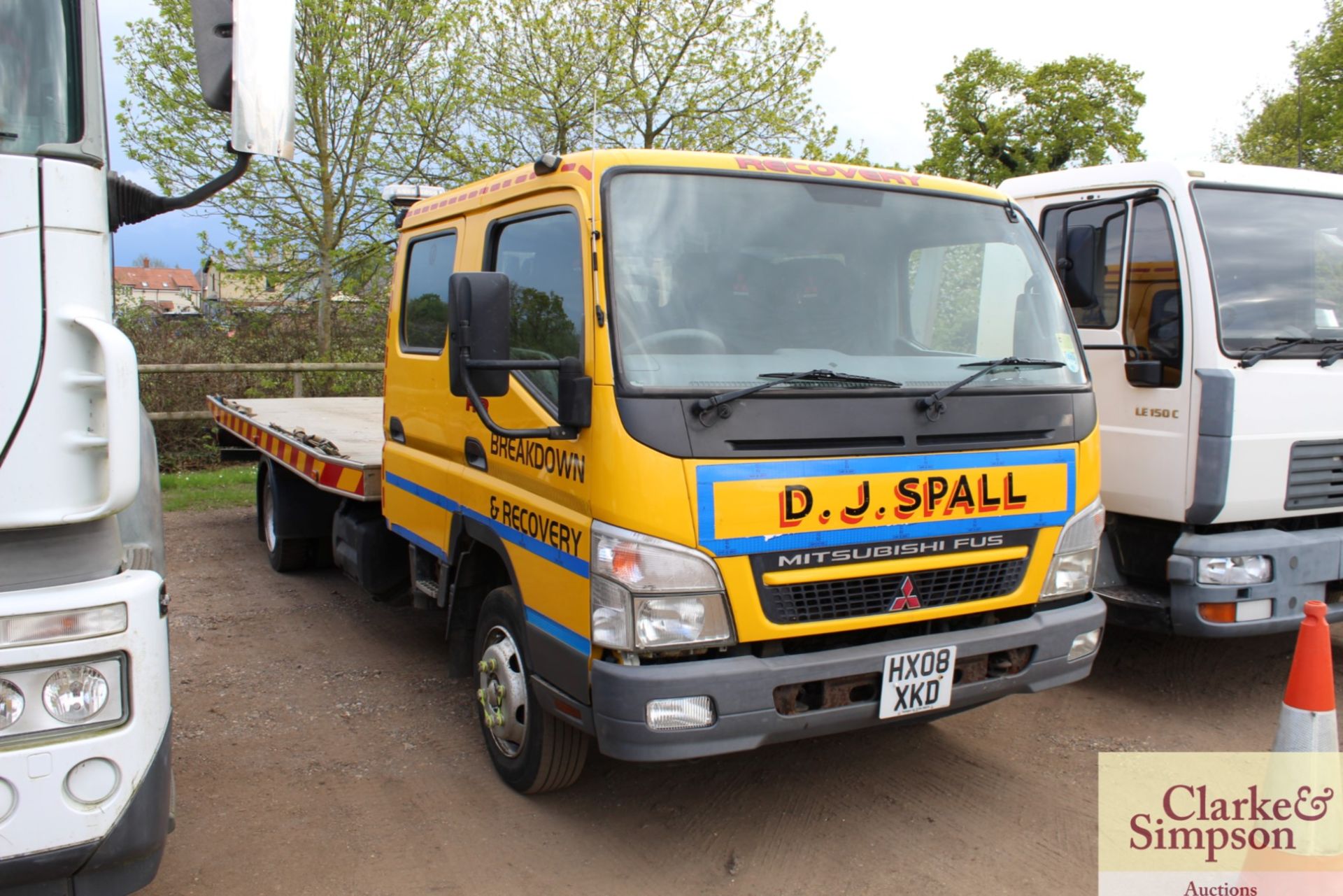 Mitsubishi Canter 7.5T crew cab 4x2 tilt and silde recovery lorry. Registration HX08 XKD. Date of