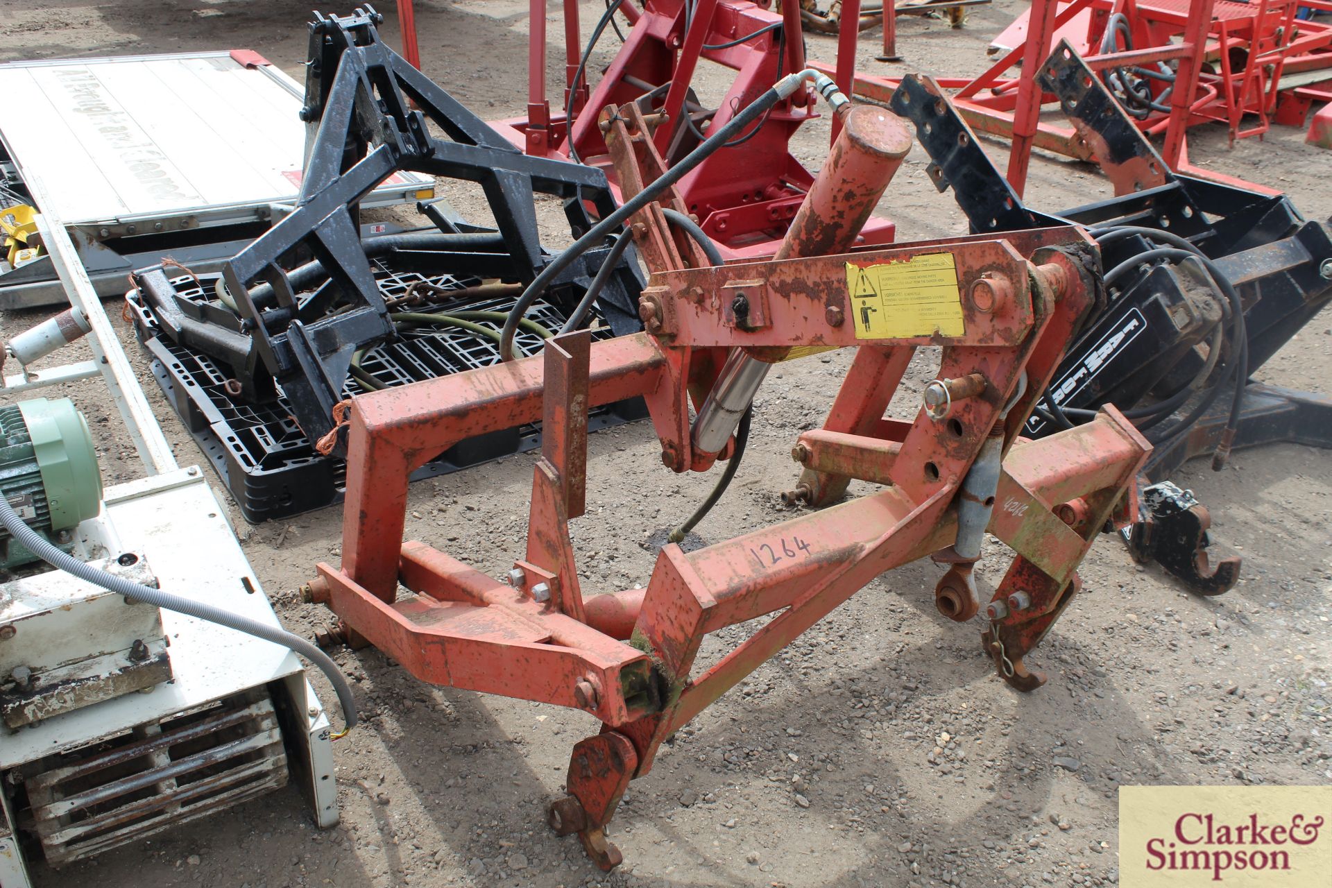 Kuhn up and over drill linkage for power harrow. *