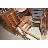 An Edwardian elbow chair; and a Georgian mahogany