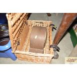 A wicker basket and a mantel clock