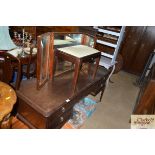 A Stag dressing table and stool