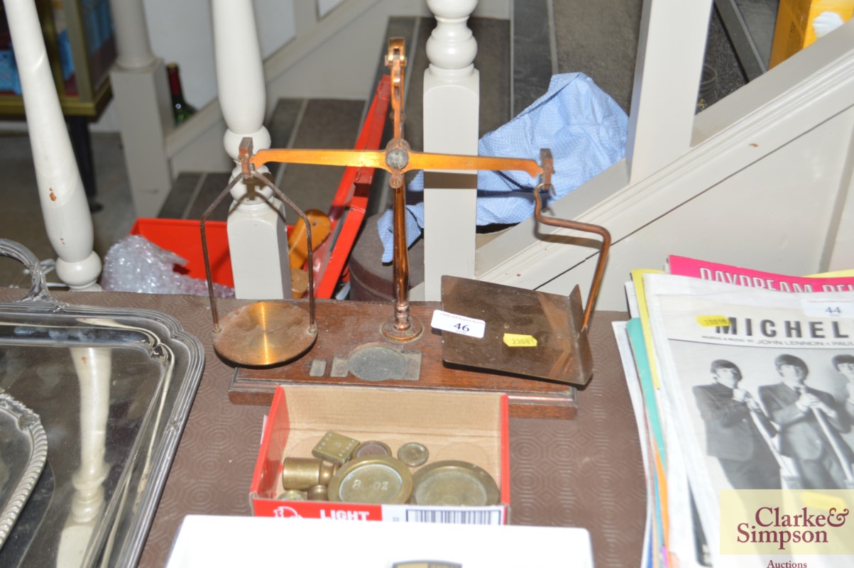 A set of postage scales and weights
