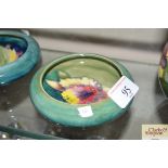 A Moorcroft 'Iris' pin bowl with graduating blue g