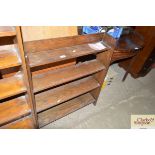 An oak open fronted bookcase