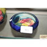 A Moorcroft 'Freesia' pin bowl with purple and yel